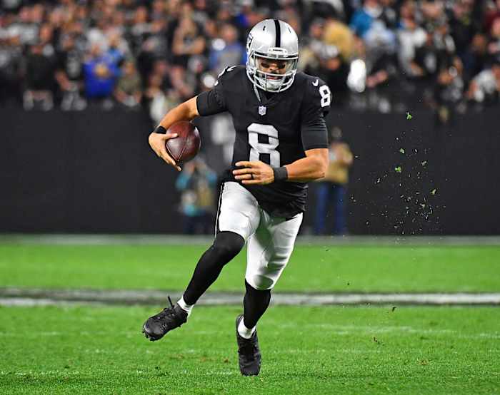 Jan 9, 2022; Paradise, Nevada, USA; Las Vegas Raiders quarterback Marcus Mariota (8) rushes with the ball during the fourth quarter against the Los Angeles Chargers at Allegiant Stadium.